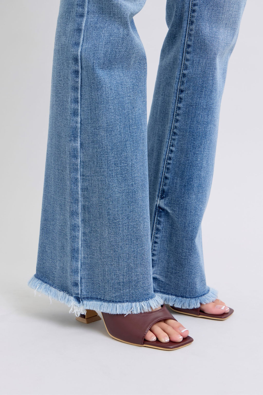 Judy Blue Raw Hem High Rise Bootcut Jeans In Medium Wash